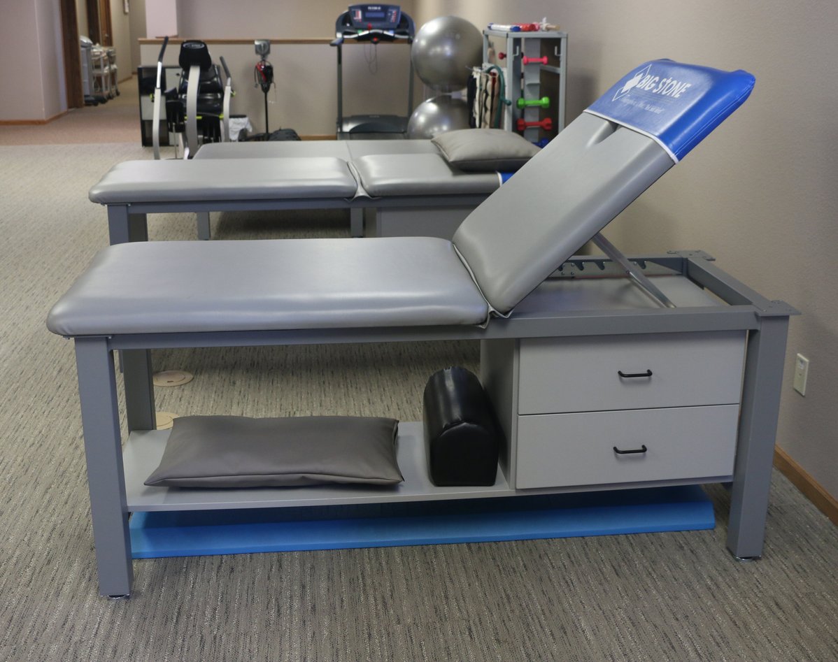 Aluma Elite Basic Treatment Tables with branding