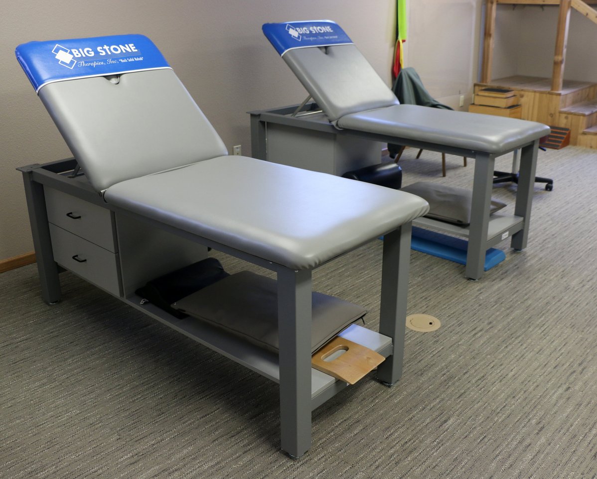 Aluma Elite Basic Treatment Tables with branding